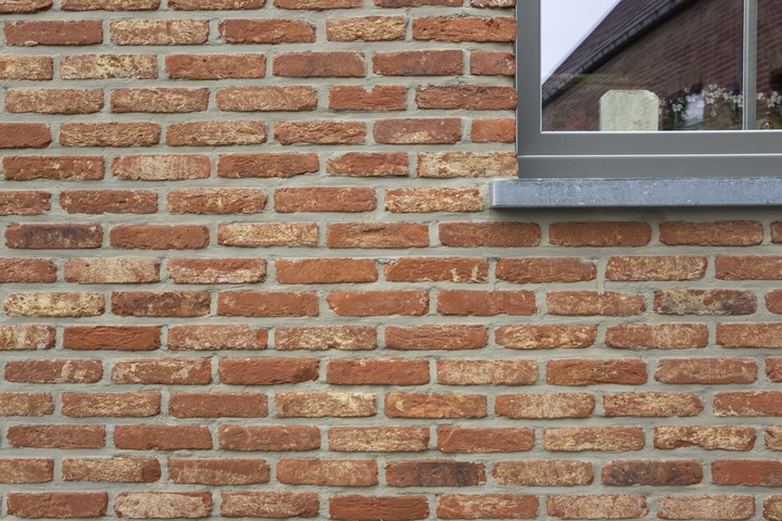 Gevelstenen Rood Oud Maasland woning