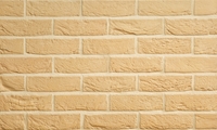 Crème witte gevelstenen van Vandersanden met beige voeg