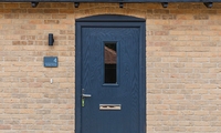 Façade and door of one of the 17 Shrubland luxury homes in Norfolk, UK