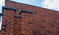 Premium DistIlers w starogardzie gdańskim w cegle czerwonej z brązowymi akcentami